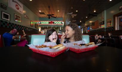 kids enjoying burgers at dyers