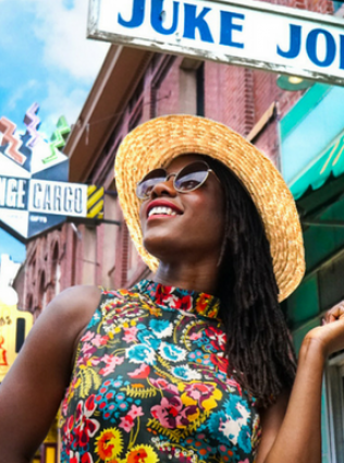 Woman smiling outside of Juke Joint in Memphis