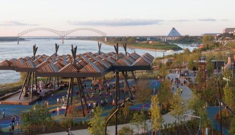 Tom Lee Park from above overlooking the playground, sunset canopy and the Mississippi River at dusk